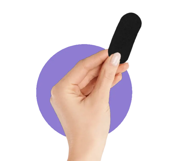 Hand holding a soft black Sleep Ease strip