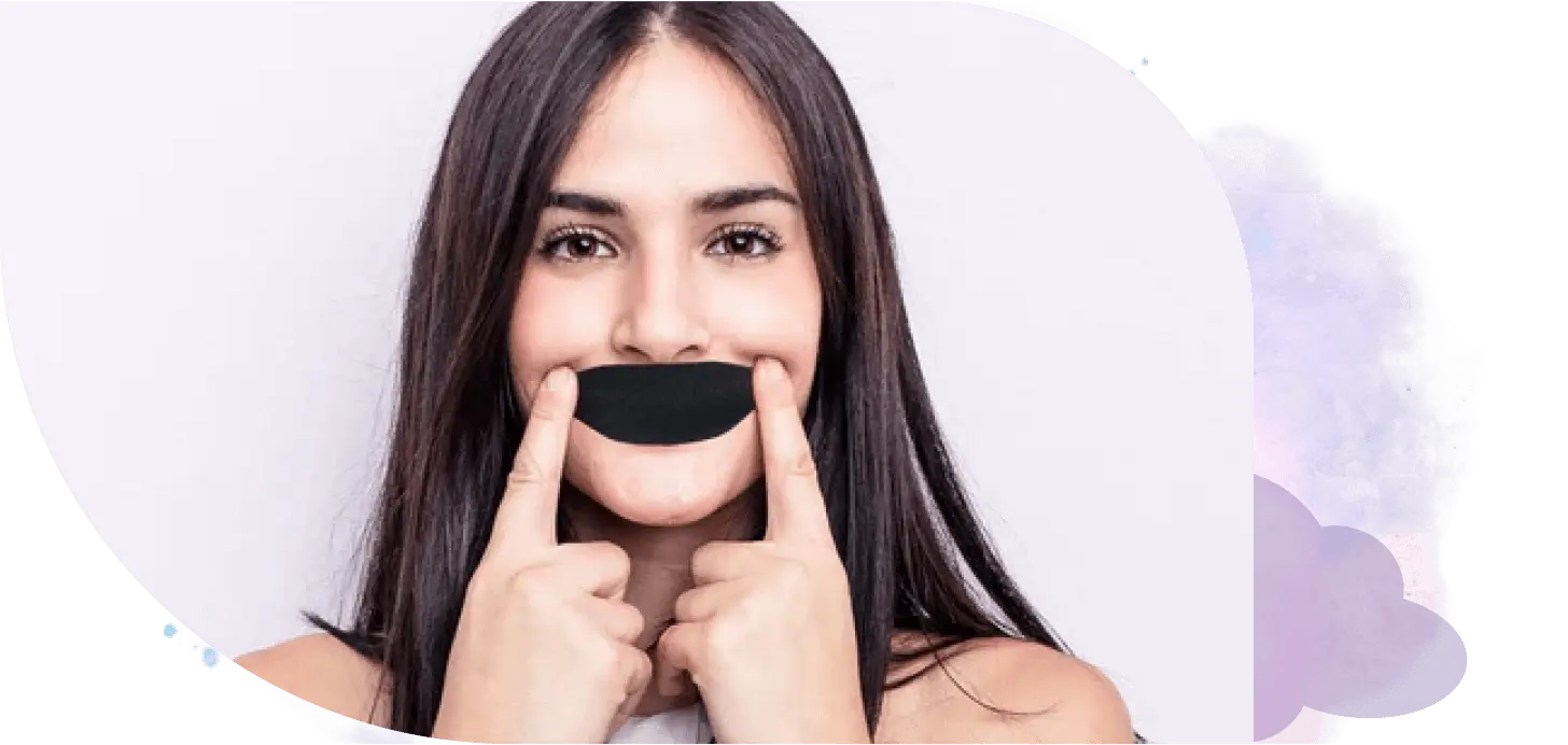 Woman demonstrating Sleep Ease mouth tape